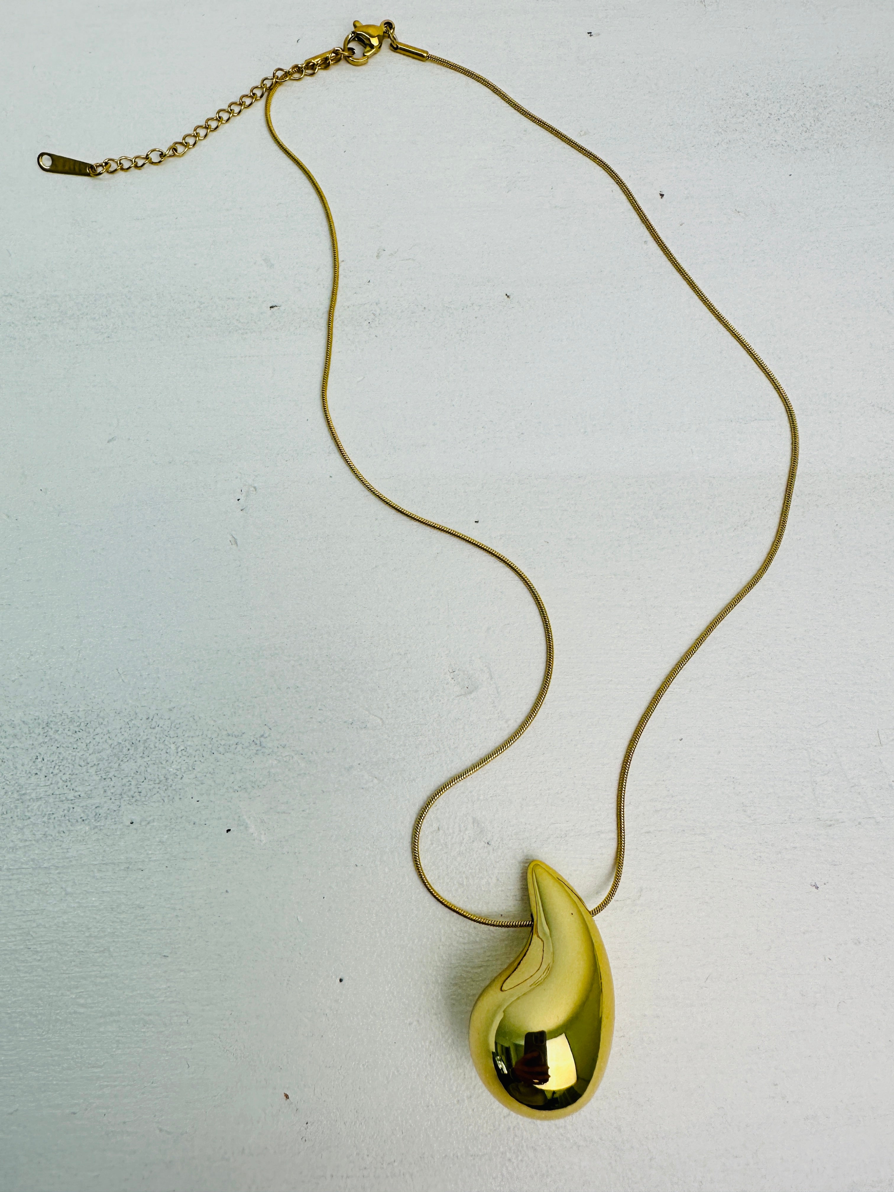 aerial view of gold necklace